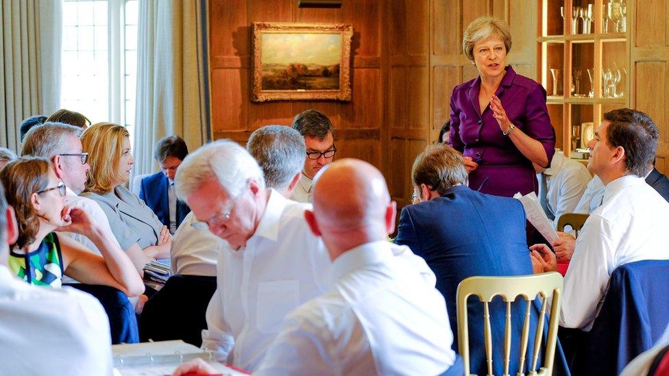 Prime Minister Theresa May speaks during a cabinet meeting at Chequers