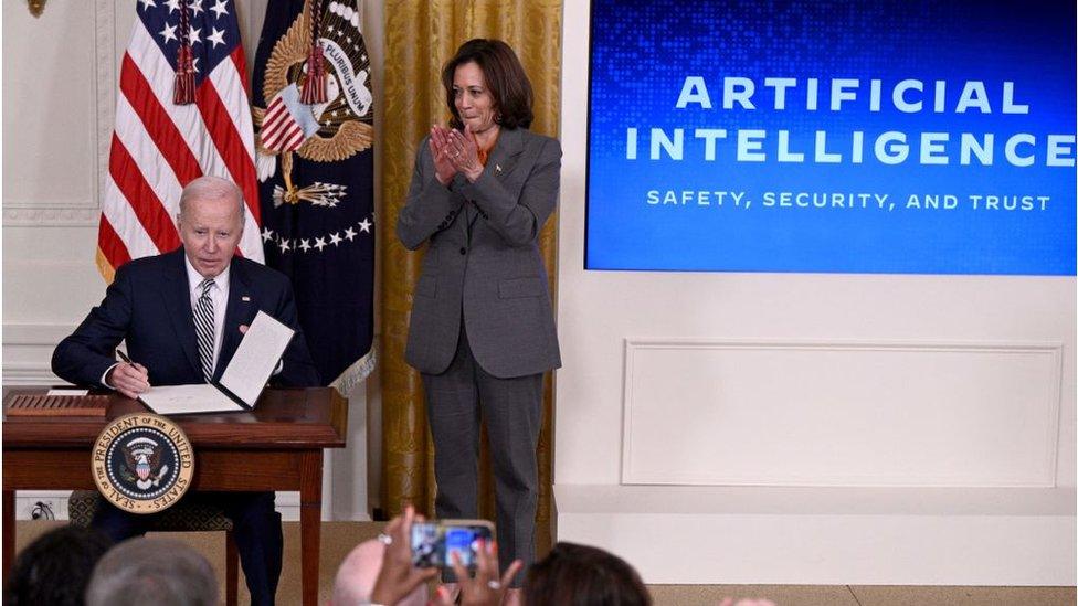 Biden and Kamala Harris at the White House signing ceremony