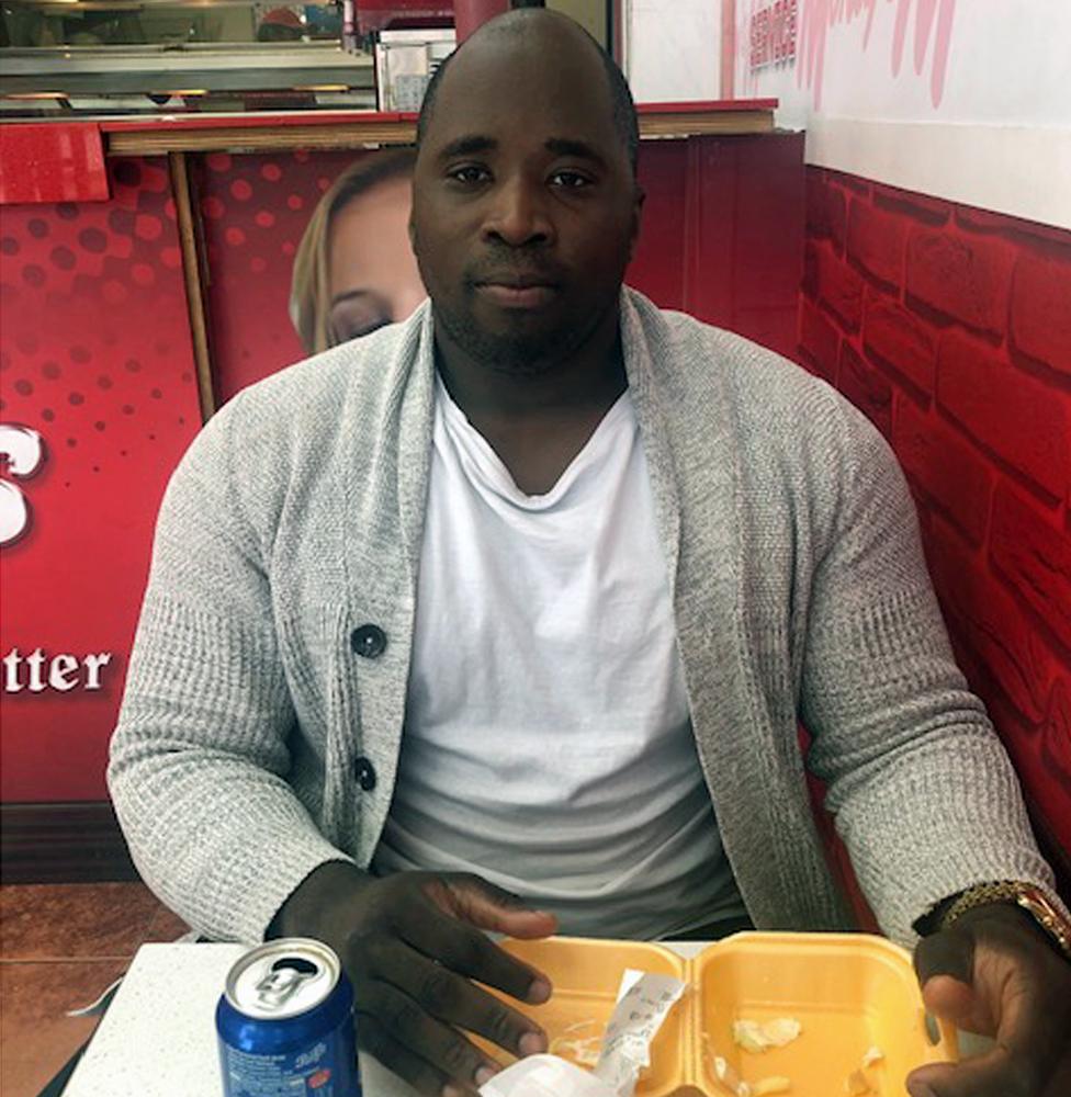 Man in chicken shop