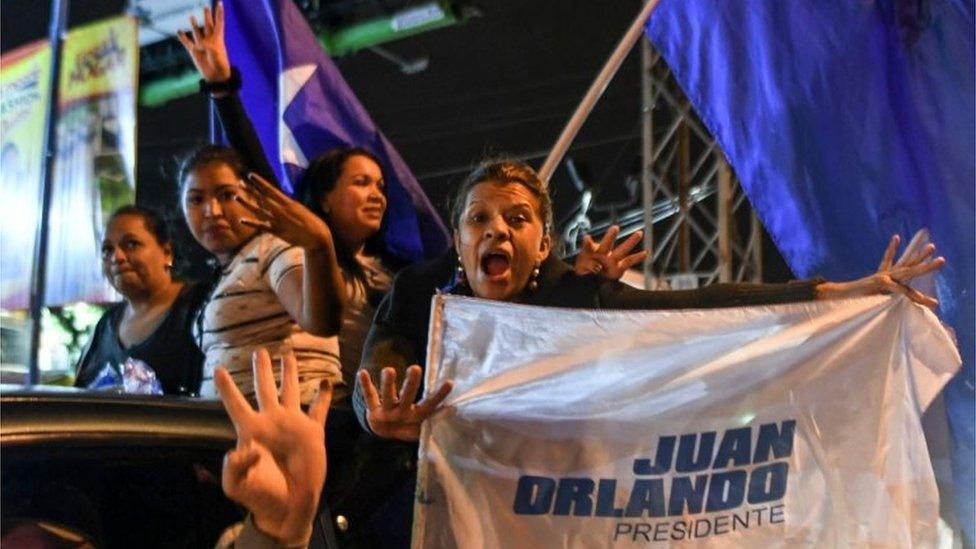 Supporters of Honduran President and presidential candidate Juan Orlando Hernandez demonstrate in Tegucigalpa, on November 27, 2017.