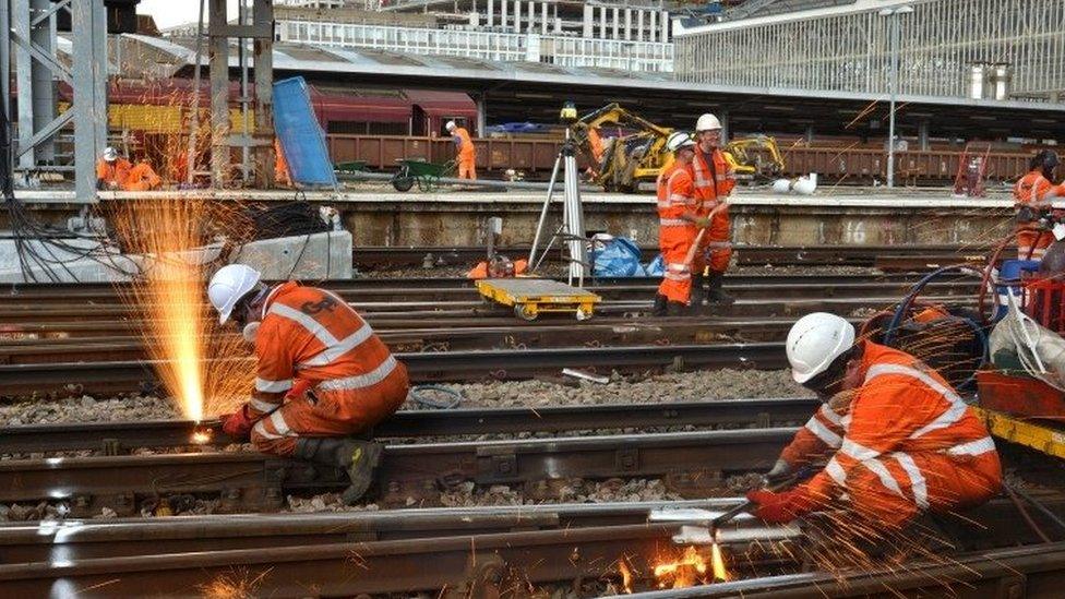 Railway workers completing engineering work