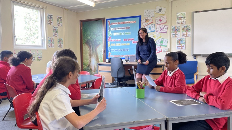 Pupils reading in a classroom at Southfield Primary, Luton