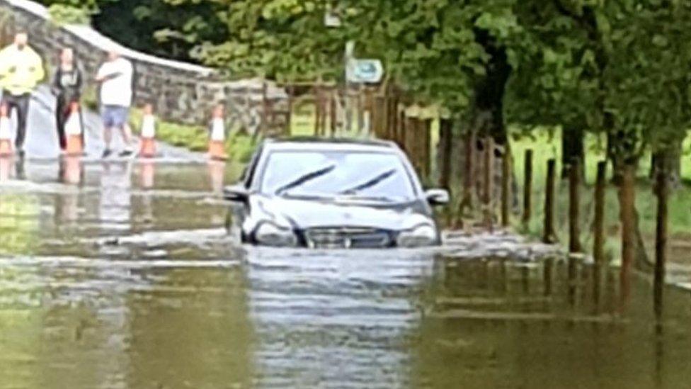 Car stuck at Dipping Bridge near Merthyr Mawr