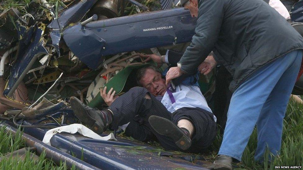 Nigel Farage is helped from the wreckage of his plane after it crashed on polling day in the 2010 election