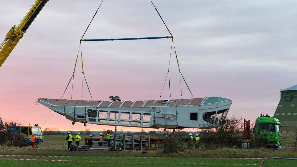 Parts of Airlander 10 being lifted off the ground