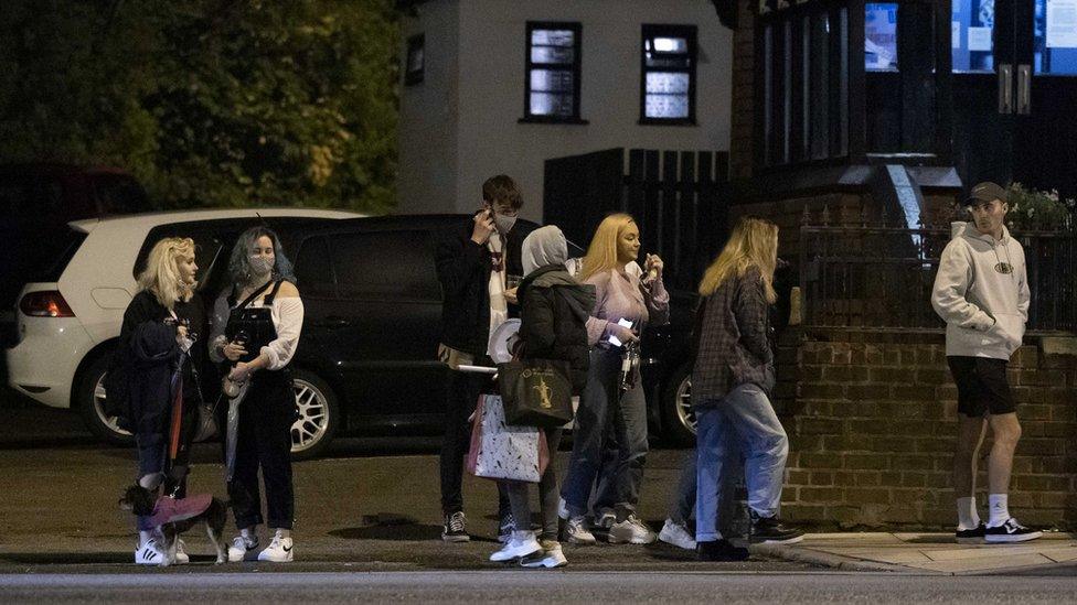 People leaving a Liverpool pub