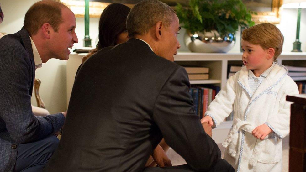 Barack Obama shakes hands with Prince George