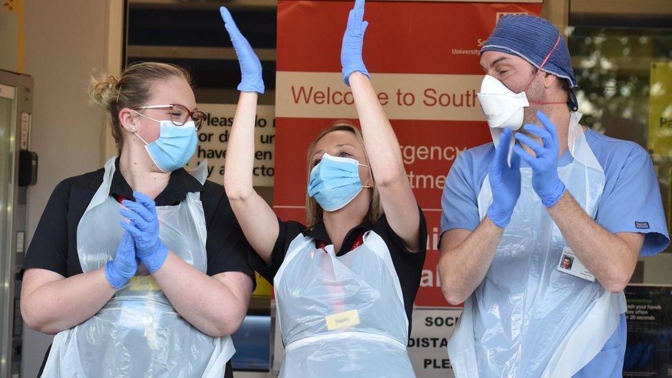 Medical staff attend the clap for carers at the Southend University Hospital on May 28, 2020