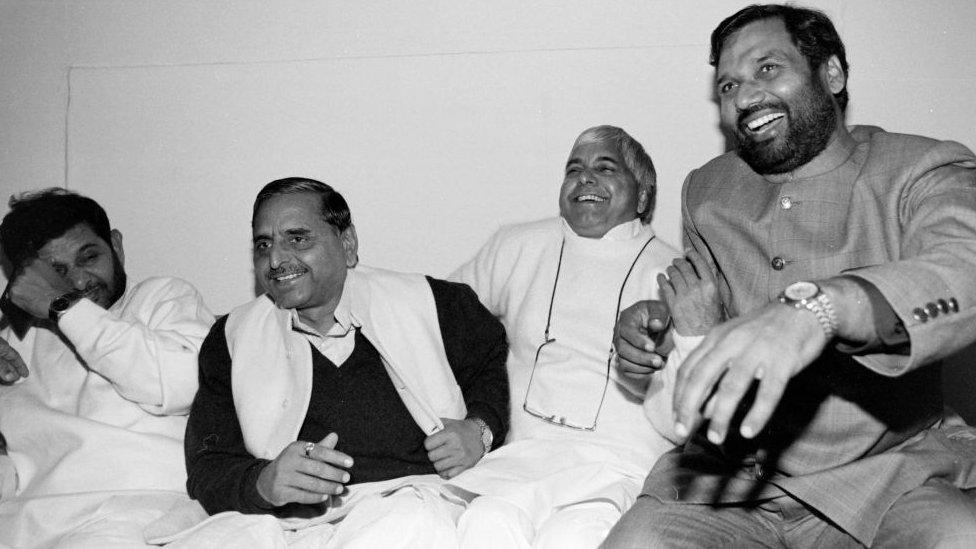 Ruling Janata Dal leaders (from L-R) Sharad Yadav, Mulayam Singh Yadav; Lalloo Prasad and Ramvilas Paswan share a light mo0ment after a meeting in New Delhi, India November 27, 1995.