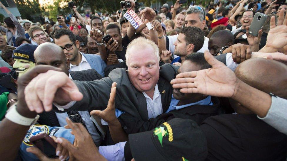 Rob Ford makes his way through thousands of people at Ford Fest in Toronto. July 2014