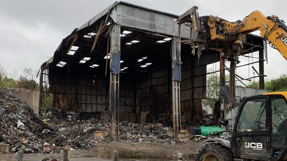 The building being demolished