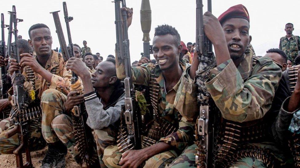 Somali military force members supporting anti-government opposition leaders gather before leaving to their bases in Mogadishu, Somalia, on May 7, 2021