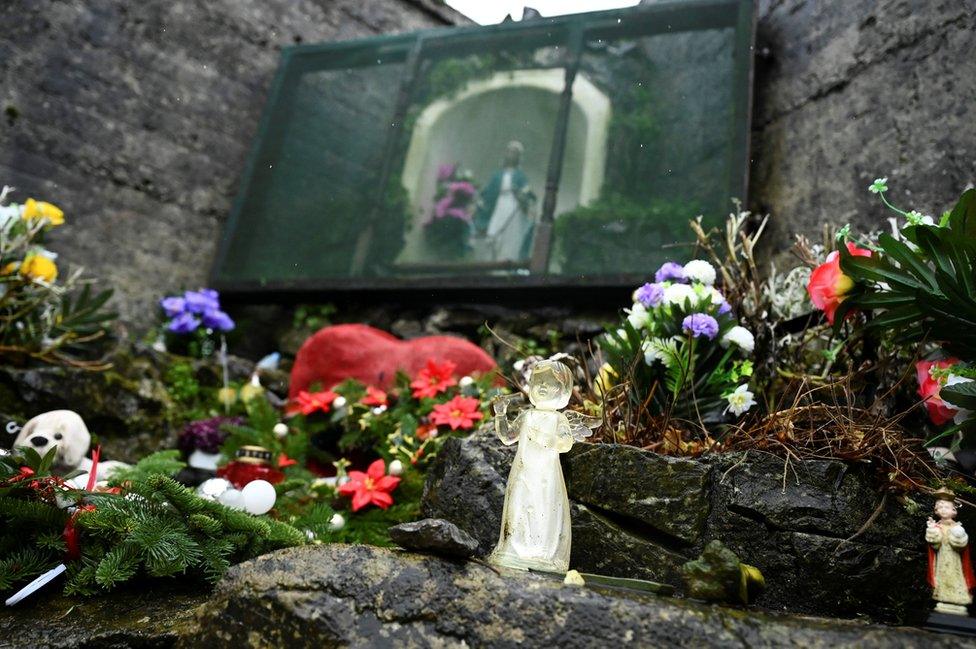 Floral tributes at a graveyard in Tuam where the bodies of 796 babies were found