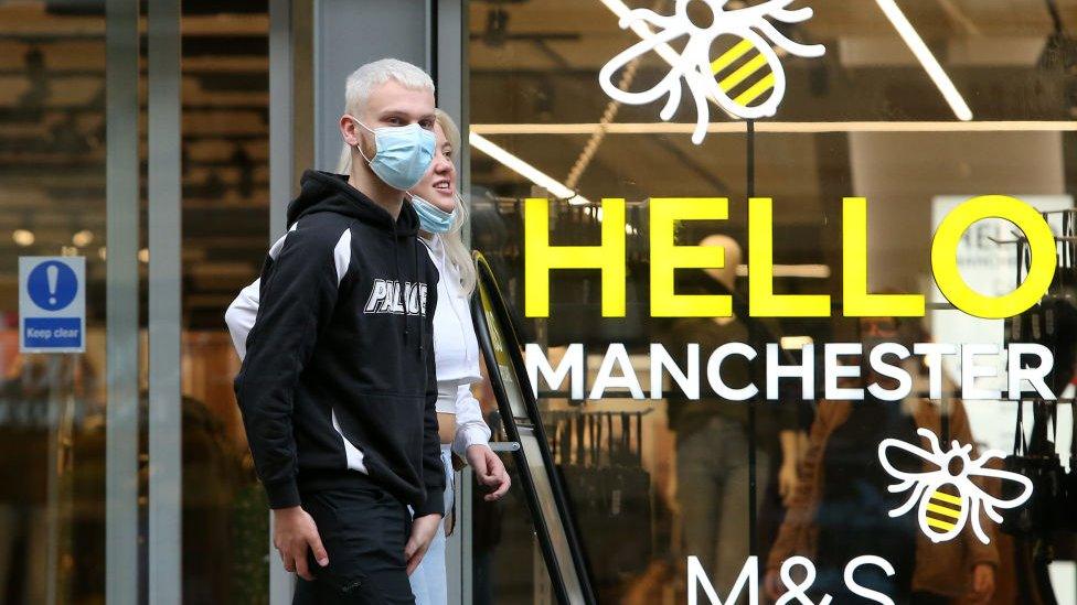 People wearing face masks in Manchester City Centre