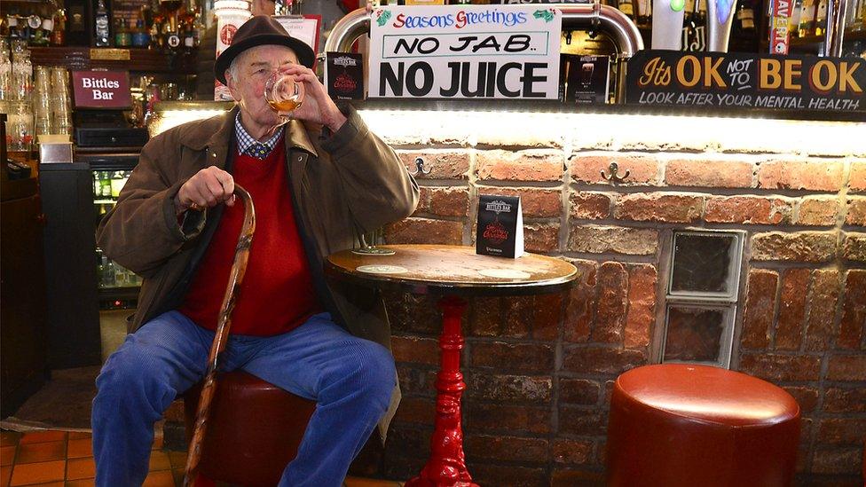 Man at bar having a drink