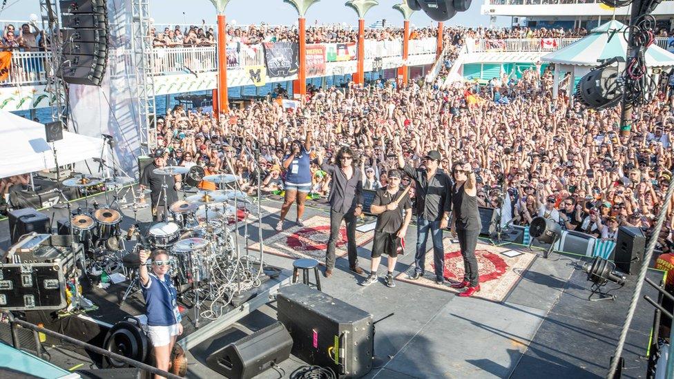 Rock band Kiss and their fans on a Kiss Kruise