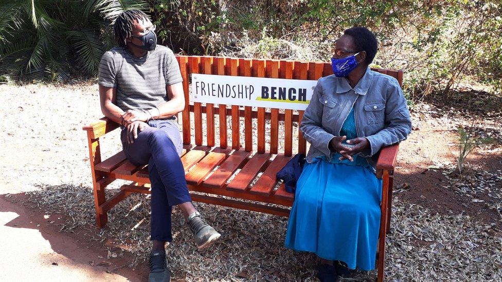 Two people on a bench