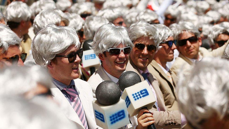 A group of cricket fans dressed up as Richie Benaud