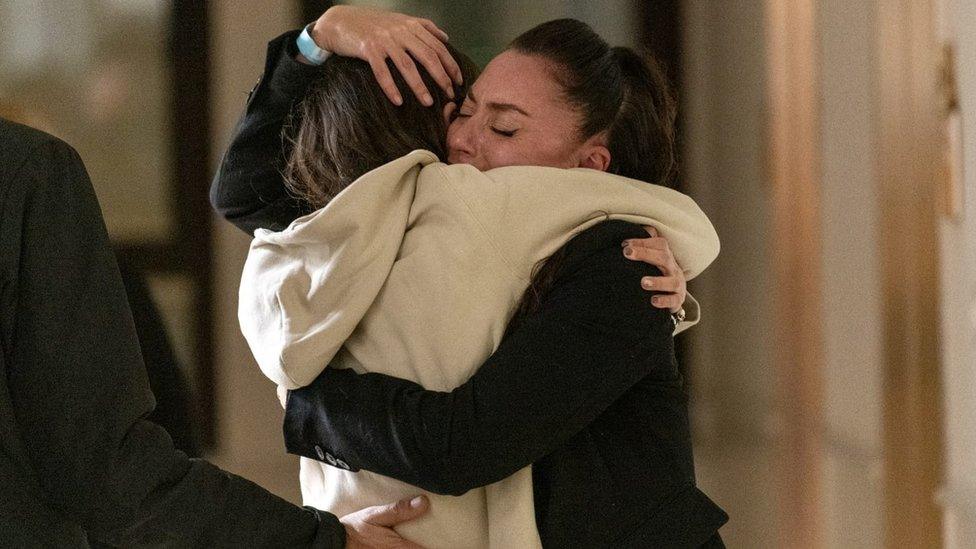 Moran Stela Yanai, 40, embraces her sister, Lea Yanai, following her arrival in Israel after being held hostage by the Palestinian militant group Hamas in the Gaza Strip, at Sheba Medical Center