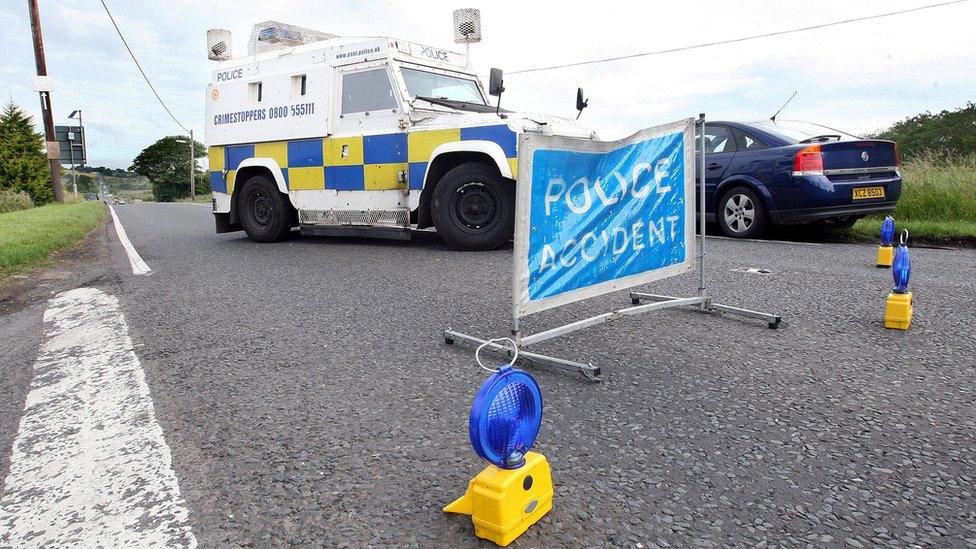 Police vehicles at the scene of a road traffic collision