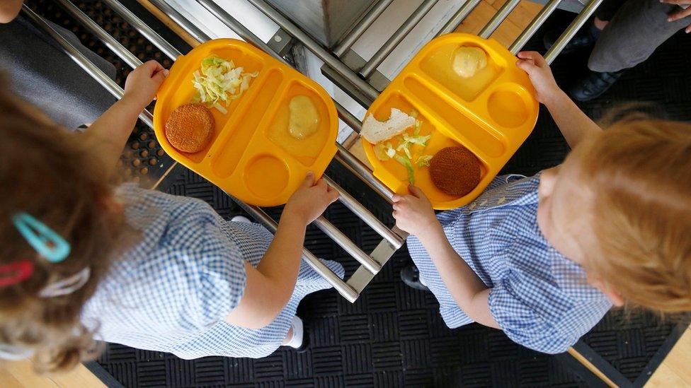 Students receiving lunch at Salusbury Primary School in north west London