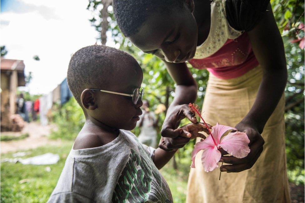 Criscent’s cousin shows him a flower