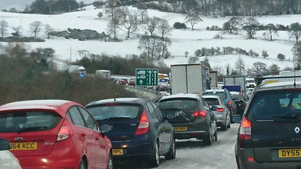 Traffic built up on Rhuallt Hill in Denbighshire after snow fell on Friday