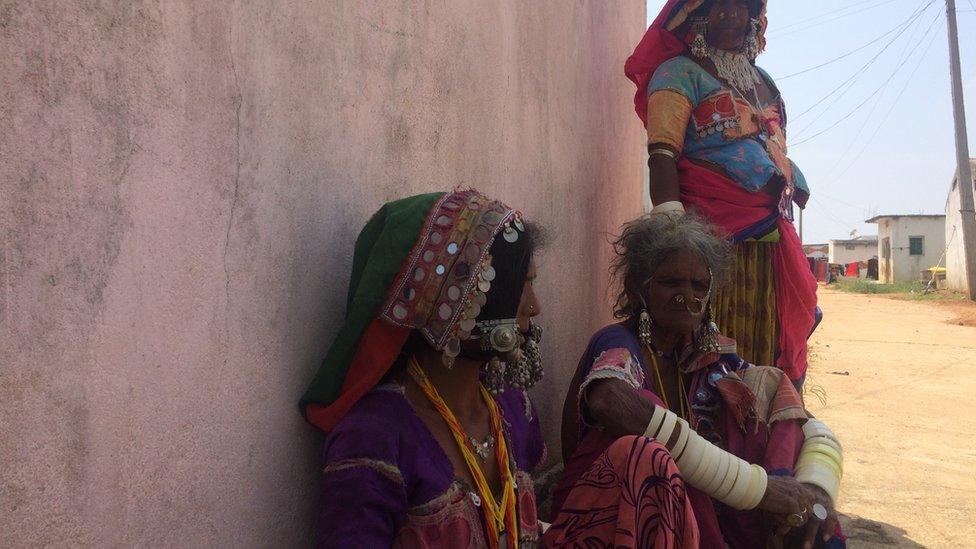 Widows of Peddakunta sit at the entrance to the village