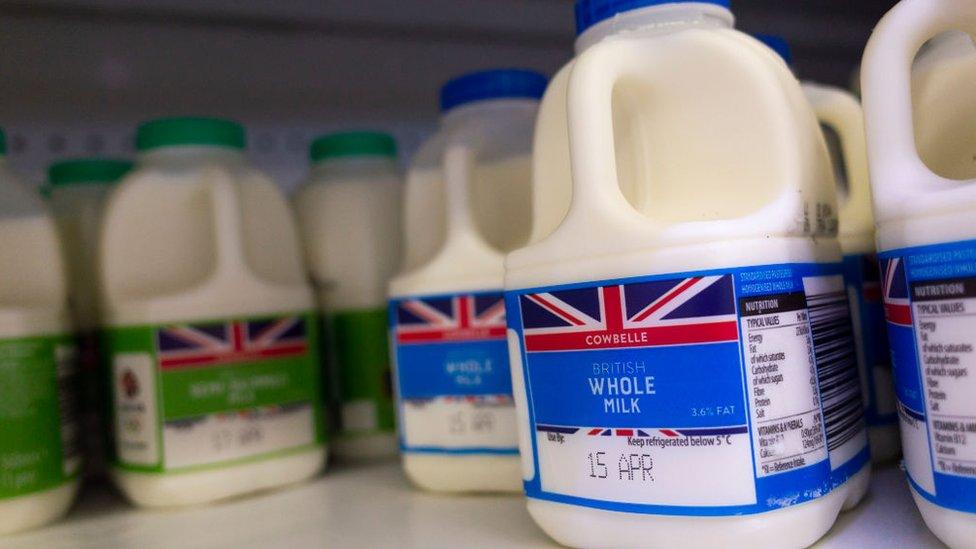 Milk on a supermarket shelves