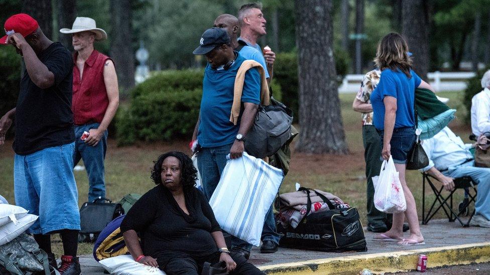 People evacuate ahead of the forecasted landfall of Hurricane Florence as they seek shelter at Emma B Trask Middle School in Wilmington, North Carolina, USA, 11 September 2018