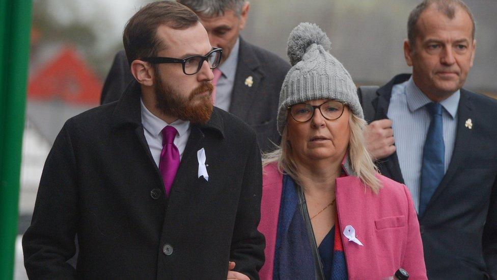 Carl Sargeant's son Jack and wife Bernadette arrive at his inquest at Ruthin County Hall