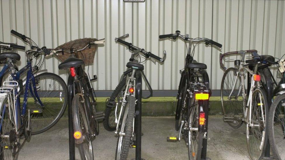 Generic photo of bicycles at a bicycle rack