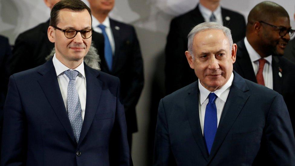 Poland"s Prime Minister Mateusz Morawiecki and Israel"s Prime Minister Benjamin Netanyahu look on during the Middle East summit in Warsaw, Poland, February 14, 2019