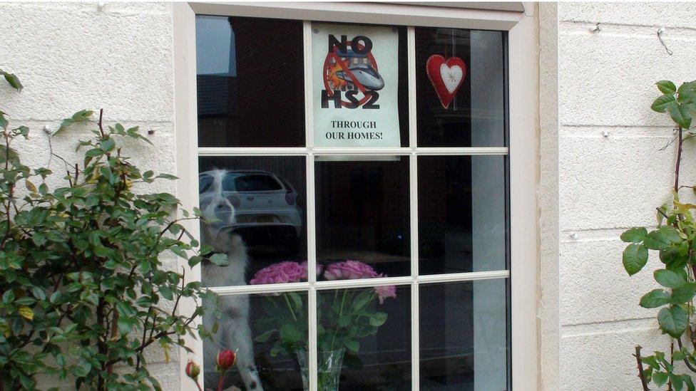 Anti-HS2 campaign poster displayed in the window of a house on the new Shimmer estate in Mexborough, South Yorkshire