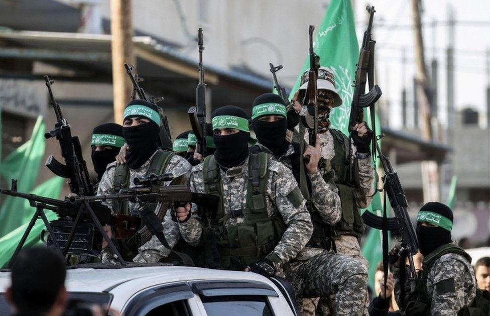 Members of the Ezzedine al-Qassam Brigades, the military wing of the Palestinian Islamist movement Hamas, take part in a rally marking the 29th anniversary of the creation of the movement on December 16, 2016.