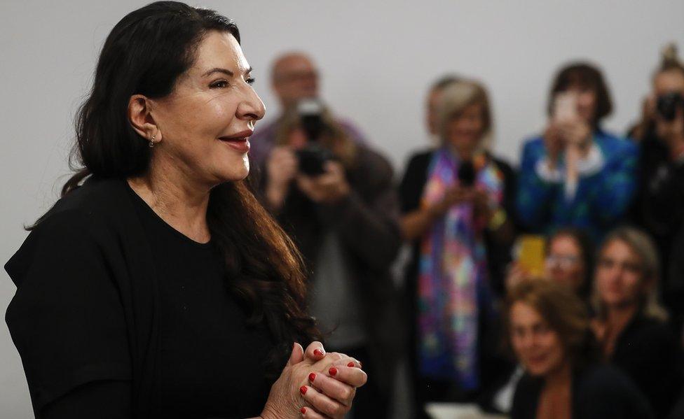 Serbian performance artist Marina Abramovic poses for the photographers during the presentation for the media of her exhibition 'The Cleaner' in Sept 2019