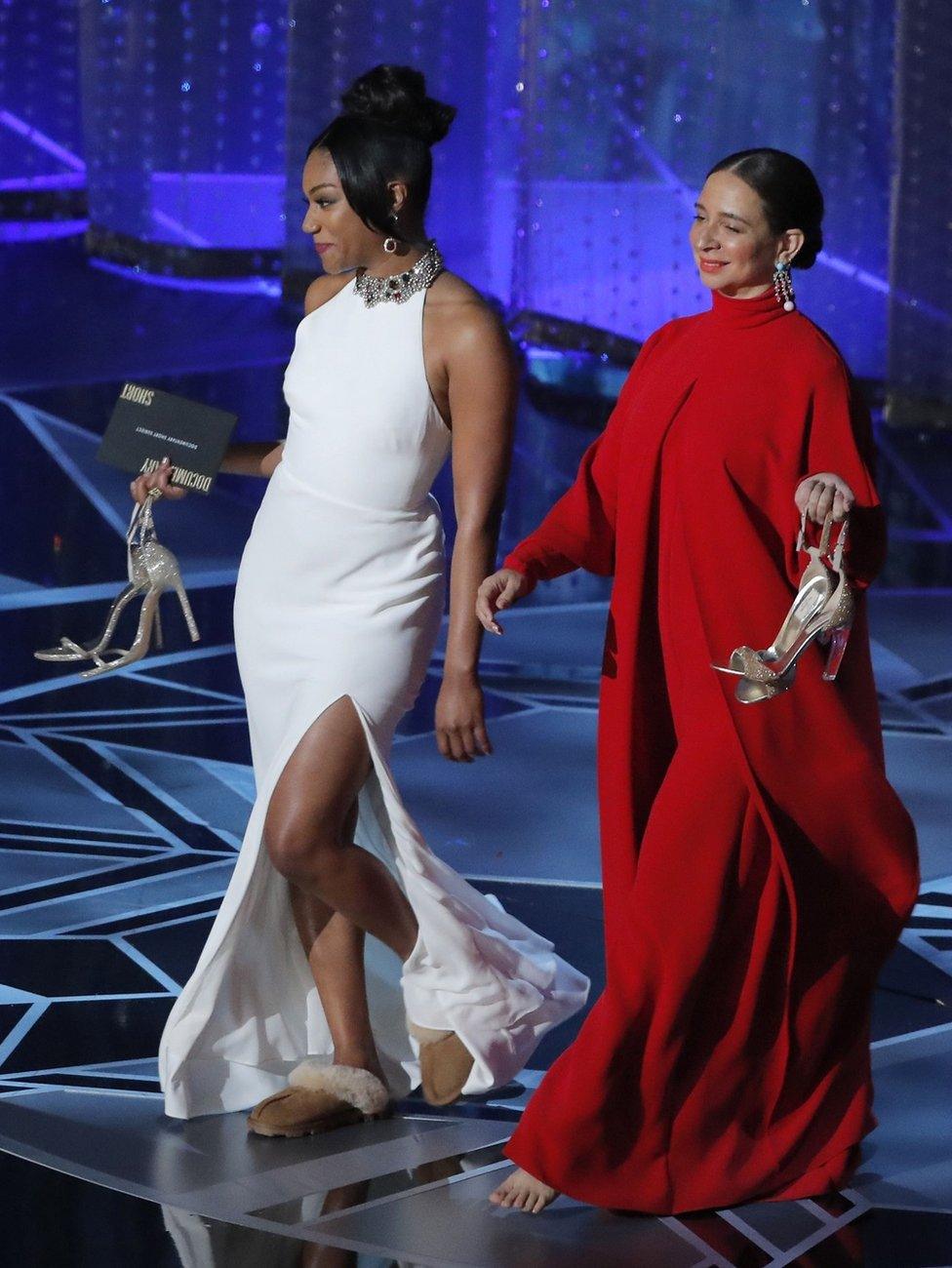 Tiffany Haddish (L) and Maya Rudolph take the stage