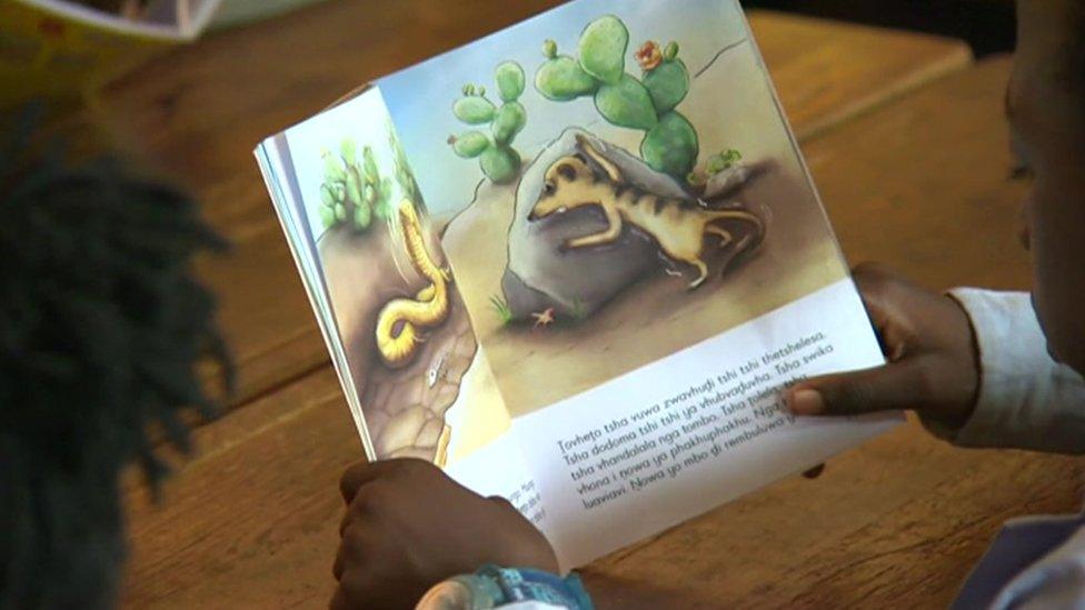 Student reading a book