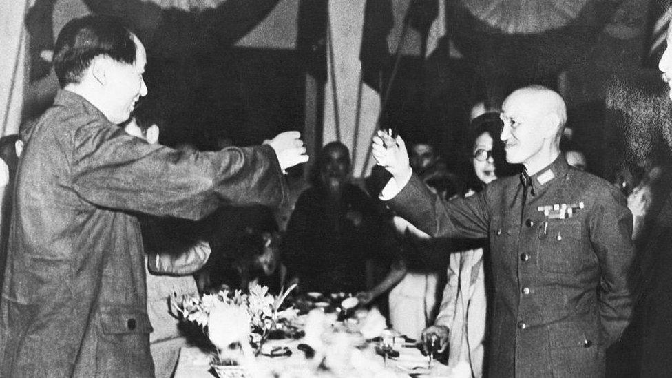 Archive photograph shows Mao Zedong and Chiang Kai Shek toasting one another at a banquet