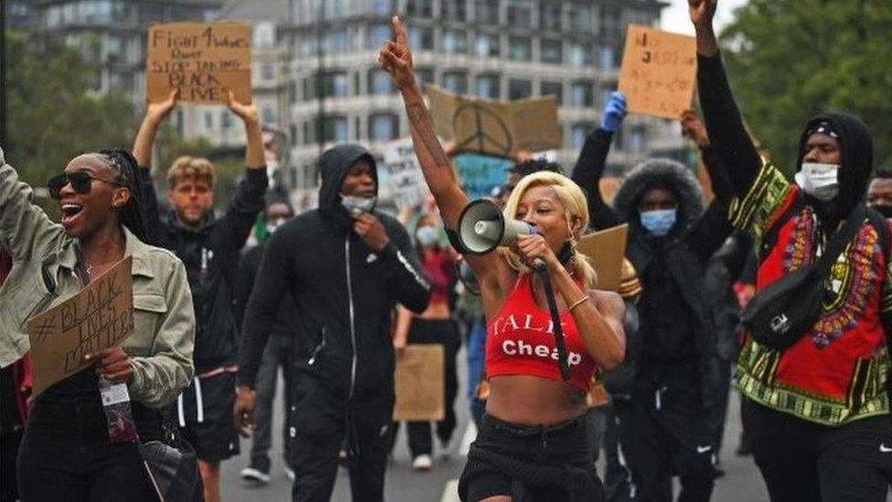 People marching to Victoria Station from Hyde Park during a Black Lives Matter protest rally in London