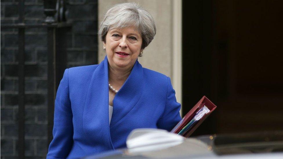 Prime Minister Theresa May leaves 10 Downing Street in central London