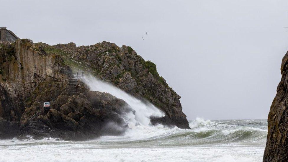 Waves hitting rocks in Tenby