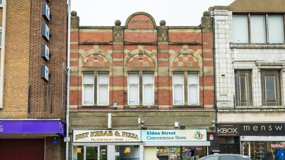 Shops along Eldon Street, between Regent Street and the junction of Market Hill