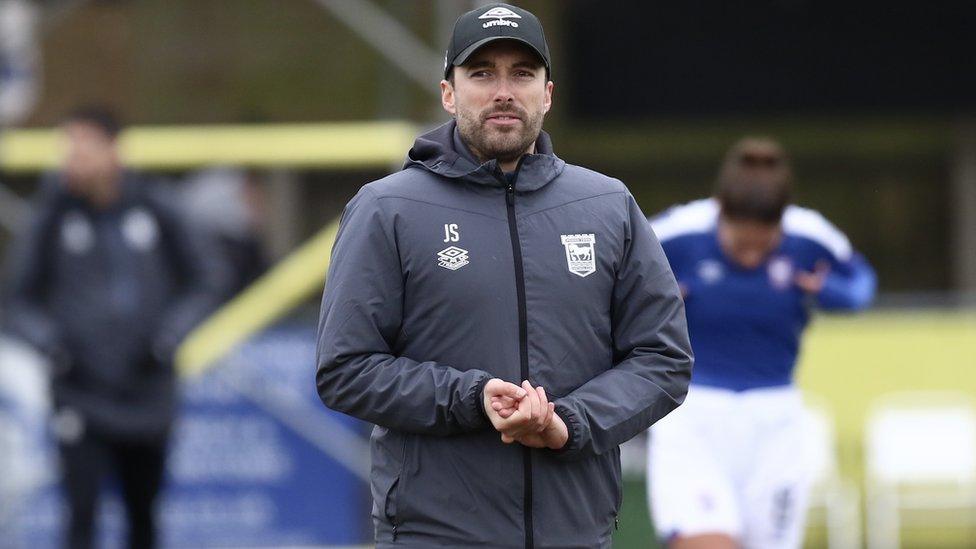 Manager Joe Sheehan in grey tracksuit after a game