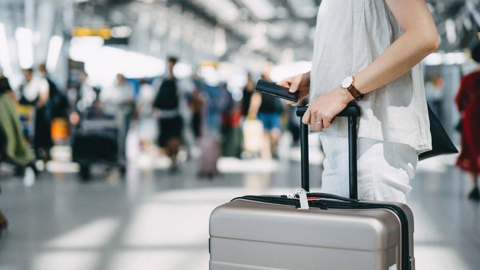 Woman going on plane