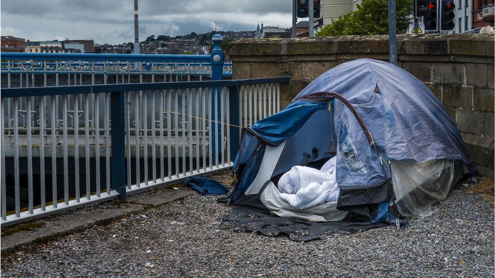 Homeless person's tent by a river