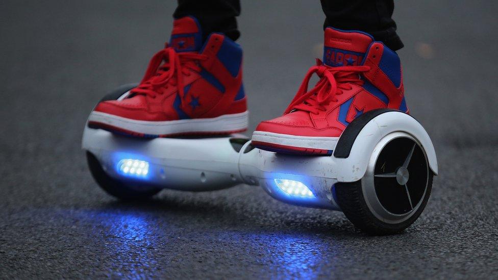 A youth poses as he rides a hoverboard, which are also known as self-balancing scooters and balance boards, on October 13, 2015 in Knutsford, England