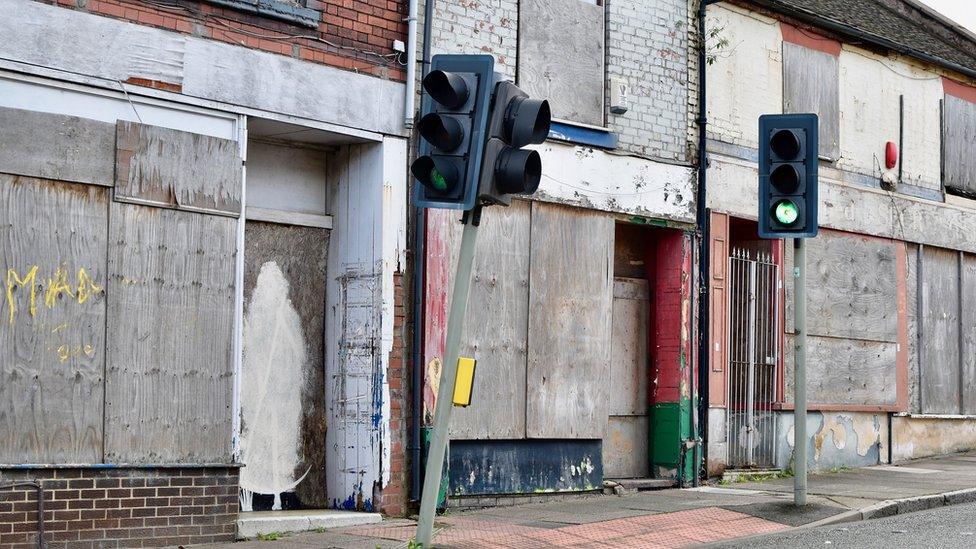 Boarded up shops on Hope Street in Hanley