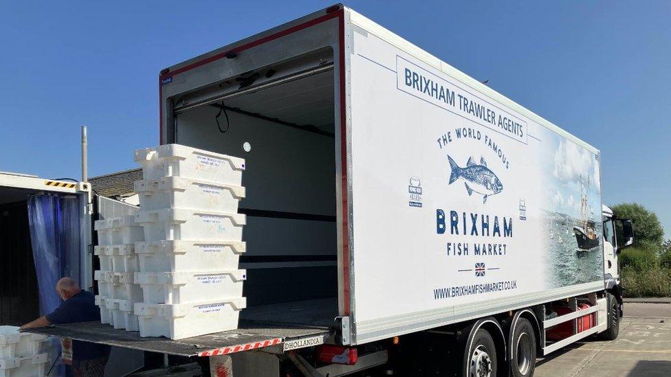 Fish being loaded into a lorry for the Brixham market