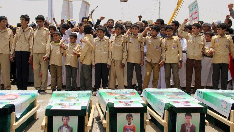 Children at the funerals of dozens of children killed in an air strike on the rebel stronghold of Saada, 13 August 2018